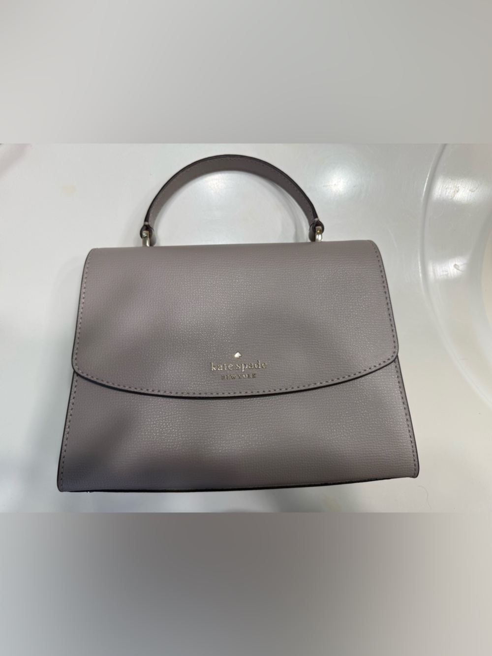 kate spade pebble leather top-handle satchel in mauve gray